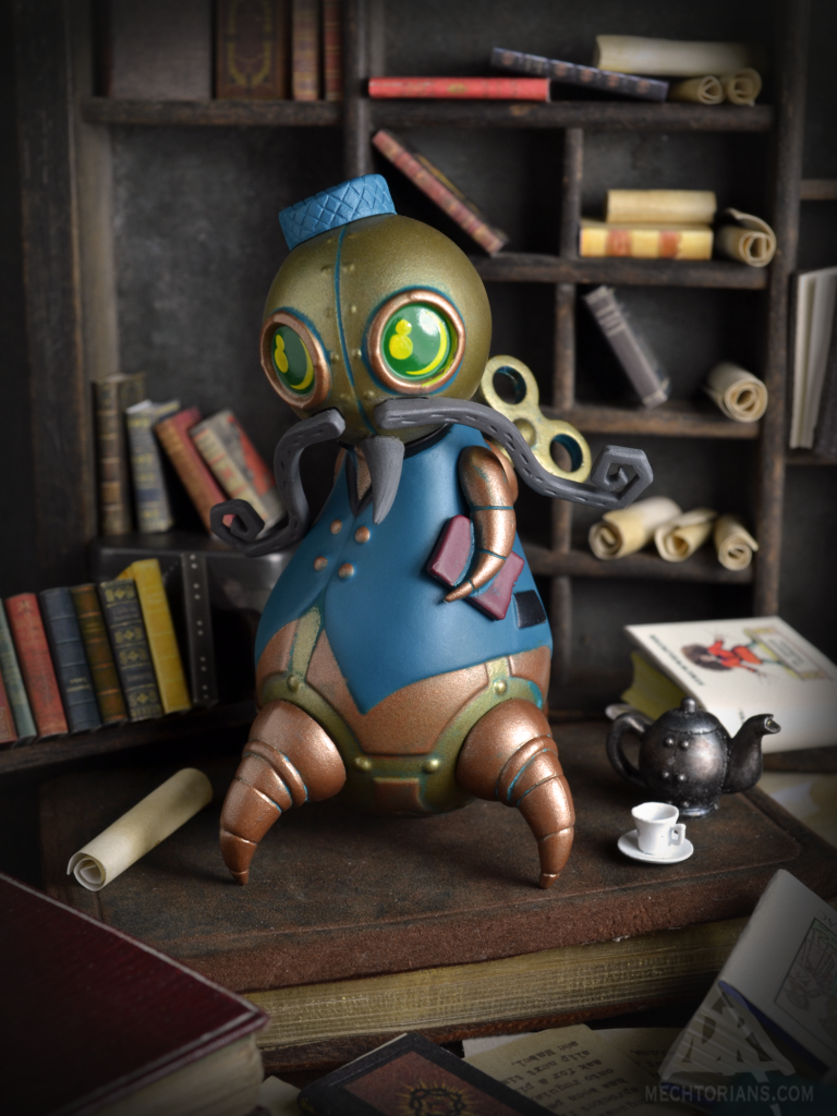 Reginald Clawfoot ; Librarian vinyl toy. Part of the Mechtorians Series 2 set.
Designed by Doktor A.
Bruce Whistlecraft. 
Produced by Kidrobot.
2018.