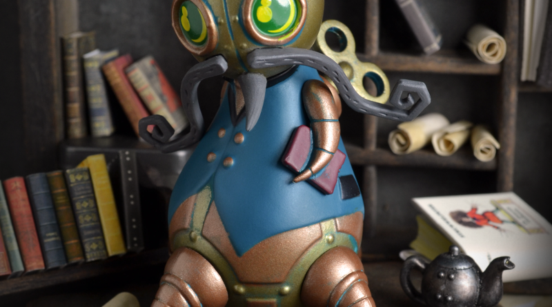 Reginald Clawfoot ; Librarian vinyl toy. Part of the Mechtorians Series 2 set. Designed by Doktor A. Bruce Whistlecraft. Produced by Kidrobot. 2018.