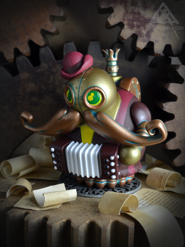 Maurice Jaques - Accordion player.
Part of Mini Mechtorians Series 2 vinyl toys. 
Designed by Doktor A. 
Bruce Whistlecraft.
Produced by Kidrobot.
2018.