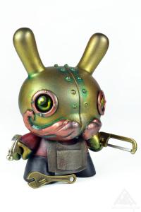 D. I. Why?Mechtorian customised Dunny art toy from Kidrobot. By Doktor A, Bruce Whistlecraft. 2023. Front Right.