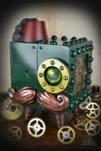 Colonel Rombus. A mechtorian resin art toy designed by Bruce Whistlecraft, Doktor A.A Custom Green and Brass version.