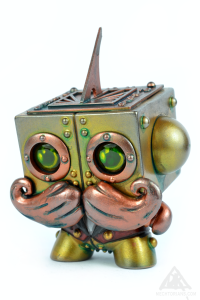 Sonny Dial Jnr. Mechtorian Customised Tofu Dunny vinyl toy. By Doktor A. Bruce Whistlecraft.2022.Arabic-Front-Left-WEB