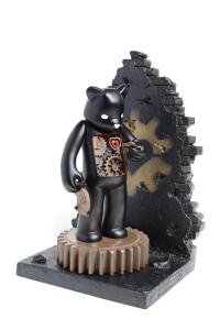 The Mechanics of Life.Resin and vinyl Bear figures.In collaboration between Luke Chueh, Munky King Toys and Doktor A, Bruce Whistlecraft.Black Bear on wall base.