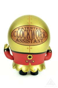 Jaspar Patented Clockwork Assistant. A Blindbox vinyl art toy by Doktor A, Bruce Whistlecraft.Platform toy created by Gary Ham and Martian Toys. 2019. Back.