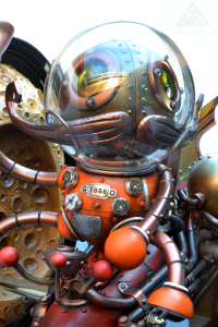 The Man in the Moon. Mechtorian robot on a spaceship toy sculpture by Doktor A. Bruce Whistlecraft.