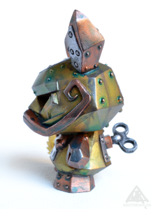 Facet Fractions.Mechtorian customised mini resin Shard art toy from Broke Piggy and Scott Tolleson. By Doktor A. Bruce Whistlecraft. 2019. B Left