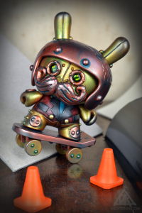 Jenson RiderMechtorian customised Dunny art toy from Kidrobot. By Doktor A, Bruce Whistlecraft. 2021. Promotional image.